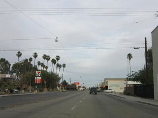 For a two-block stretch, California 115 south and Imperial County Route S-32 north share a wrong-way multiplex on Evan Hewes Highway (old U.S. 80). After passing Pine Avenue, Imperial County Route S-32 turns north onto Holt Road (Holt Avenue).