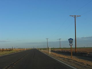 Southbound California 115 and eastbound Historic U.S. 80 approach Imperial County S-33 (Miller Road). CR S-33, the easternmost north-south county-signed road in the Imperial Valley, follows Miller Road, Highline Road, and Green Road north to its end at California 78 just west of Glamis. To the south, CR S-33 follows Miller Road and Bonesteele Road to its southern terminus at California 98.