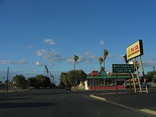 Northbound Walnut Avenue meets California 115 and Historic U.S. 80 (Fifth Street) in downtown Holtville. Turn left here for California 115 north and U.S. 80 west to El Centro or right for California 115 and U.S. 80 east to Interstate 8 and Yuma.
