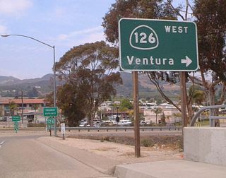 The transition from westbound California 118 onto westbound California 126 is facilitated via a loop ramp. California 126 is a freeway between California 150 in Santa Paula and U.S. 101 in Ventura. East of Santa Paula, California 126 is a multilane divided highway except through Fillmore, where there is no median barrier but still has multiple lanes of travel.