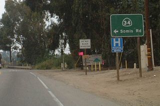 California 118 meets California 34 at this intersection. Despite its designation as a two-digit state route, California 34 is a fairly minor state highway with no freeway alignments. It connects California 1, U.S. 101, and California 118.