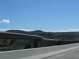 A high bridge carries California 118 over Arroyo Simi.