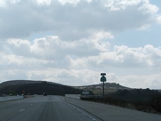 The two-lane transition ramp from California 118 west to California 23 south. A lone California 23 south reassurance shield is posted, but it is located prior to the point where traffic from California 23 south merges onto the freeway.