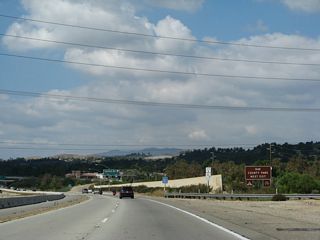 Use Exit 19B (Collins Drive) to Oak County Park.