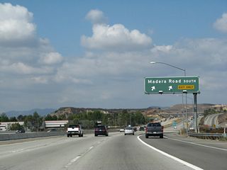 Immediately thereafter, westbound California 118 (Ronald Reagan Freeway) meets Exit 22A, Madera Road south to El Rancho Simi and the Reagan Presidential Library. This interchange was built in 1976.