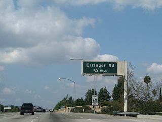 The next exit along California 118 (Ronald Reagan Freeway) west is Exit 24, Erringer Road.
