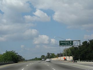 The next exit along California 118 (Ronald Reagan Freeway) west is Exit 25, Sycamore Drive.