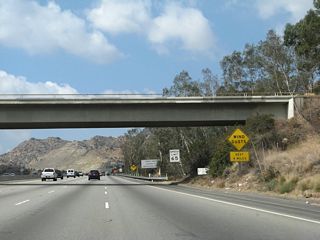 Strong wind gusts are possible as California 118 climbs and crosses over Santa Susana Pass.