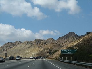 The next exit along California 118 (Ronald Reagan [Simi Valley] Freeway) is Exit 32, Rocky Peak Road. This exit also leads to Santa Susana Pass Road.
