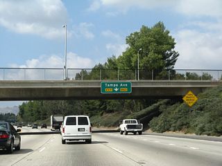 The right lane of California 118 (Ronald Reagan [Simi Valley] Freeway) west becomes exit only for Exit 37, Tampa Avenue.
