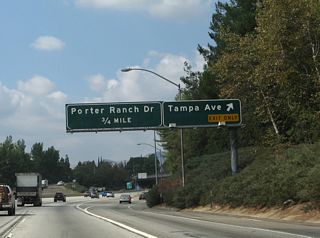 Westbound California 118 (Ronald Reagan [Simi Valley] Freeway) meets Exit 37, Tampa Avenue. This interchange is partially located in Limekiln Canyon Park. The second exit is Exit 36, Porter Ranch Drive.