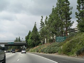 This mileage sign provides the distance to Chatsworth, Simi Valley, and Moorpark via California 118 west. Omitted is the western terminus of Ventura.