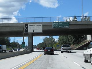 This mileage sign provides the distance to the next three exits along California 118 (Ronald Reagan [Simi Valley] Freeway) west: Exit 38, Reseda Boulevard; Exit 37, Tampa Avenue; and Exit 36, Porter Ranch Drive.