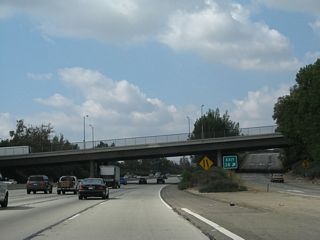 The off-ramp to Exit 38, Reseda Boulevard actually connects to Rinaldi Street, which parallels California 118 to the north. Upon exiting, turn right to connect with Reseda Boulevard. The overpass in this picture carries Reseda Boulevard over the freeway.