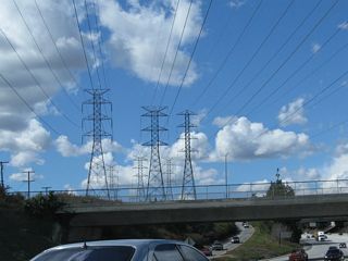 Aforementioned power lines cross over the freeway.