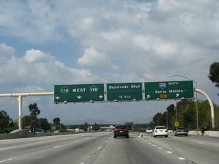 Westbound California 118 (Simi Valley / Ronald Reagan Freeway) reaches Exit 42B, Interstate 405 (San Diego Freeway) south. The next exit is Exit 42A, former California 7/Sepulveda Boulevard.