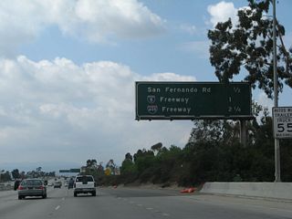 This interchange sequence sign along California 118 (Simi Valley Freeway) west provides the distance to the next three exits: Exit 44B, San Fernando Road (old U.S. 6-99); Exit 44A, Interstate 5 (Golden State Freeway); and Exit 42B, Interstate 405 (San Diego Freeway).