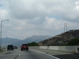 California 118 (Ronald Reagan [Simi Valley] Freeway) begins at Interstate 210 (Foothill Freeway) near San Fernando. A freeway from San Fernando west to Simi Valley, California 118 is a busy east-west freeway route that parallels U.S. 101 through the San Fernando Valley. These pictures follow the transition from Interstate 210 west to California 118 west.