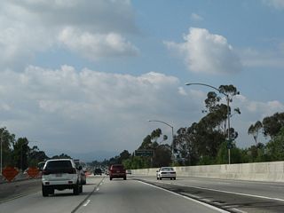 The first California 118 west reassurance shield is posted after the transition ramp from Interstate 210 east merges with the ramp from Interstate 210 west.