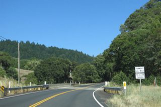 Beebe Creek flows west into parallel Rancheria Creek beyond the bridge along SR 128 at post mile 38.80.