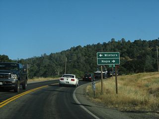 Advancing southeast, SR 128 (Capell Valley Road) crosses Capell Valley to the north end of SR 121 (Monticello Road).