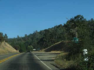 The confirming marker for SR 128 east of SR 121 was gone by 2021.