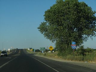 SR 128 (Grant Avenue) meets Interstate 505 at a six-ramp parclo interchange (Exit 11).
