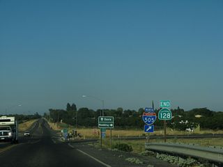An end shield for SR 128 stands at the loop ramp for Interstate 505 northbound.