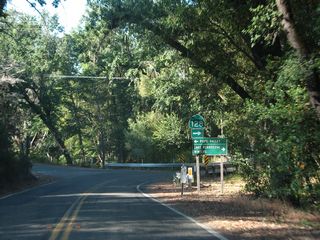 Leaving Sage Canyon, SR 128 leads north to intersect Lower Chiles Road north to the nearby Nichelini Winery vineyards and Pope Valley. This sign assembly was removed after 2013.