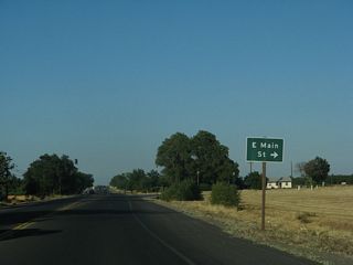 Main Street (old California 128) returns to California 128 in east Winters.