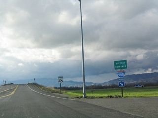 California State Route 128 begins where Yolo County Route E-6 ends at the interchange with Interstate 505. I-505 north connects to Interstate 5 near Dunnigan.