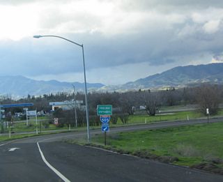 A loop ramp connects California 128 west to Interstate 505 south to I-80 at Vacaville.