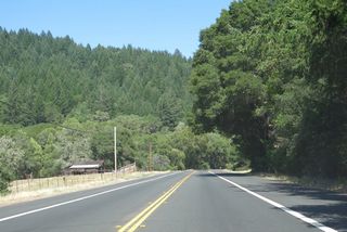 Timberland spreads along the hillside to the south of SR 128 while a mix of oak trees, pastureland and a vineyard line the north side of the highway leading to Yorkville.