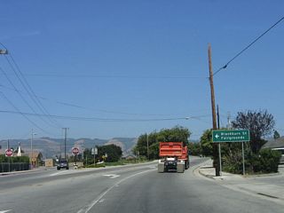 At this fork in the road, California 129/Riverside Drive turns a bit to the southeast, thus leaving the urban area of Watsonville. Farms and ranches will again come into view soon. Turn left here to Blackburn Street north to California 152 (Lake Avenue) or follow the left fork to Bridge Street, which takes a more indirect path to California 152.