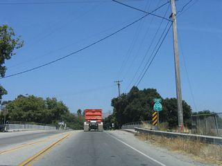 A California 129 east reassurance shield is posted shortly thereafter, at the Salsipuedes Creek bridge (built in 1938, widened in 1990).