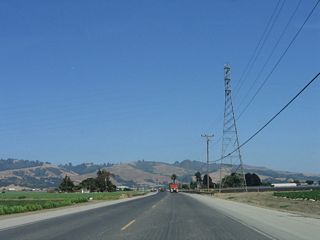 A 138-kV Pacific Gas and Electric (PG&E) power line crosses California 129.