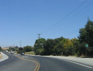 A reassurance shield for California 129/Chittenden Road is posted after the Pajaro River bridge.