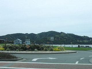 Tiburon Boulevard ends at this traffic circle across from Paradise Drive. Angel Island, one of the larger islands in San Francisco Bay, dominates the view.