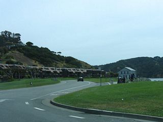 Motorists may continue straight ahead on Paradise Drive to north side of Tiburon Peninsula. The ferry landing, which provides passenger commuter service to San Francisco, launches from the nearby ferry building.