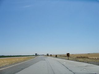 The four-lane freeway ends, with the eastbound concrete lanes abruptly ending and the westbound lanes serve both directions. It's clear that Caltrans intended to extend the eastbound lanes, but that has not happened due to budgetary and other constraints. Leaders in Modesto would someday like to see California 132 widened to four lanes from Interstate 580 east to Modesto, but construction has not yet begun.