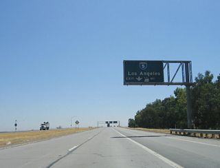 The freeway resumes immediately after leaving the Bird Road intersection. The next exit is Exit 4A, Interstate 5 south to Los Angeles. The right lane becomes exit only for this connection.