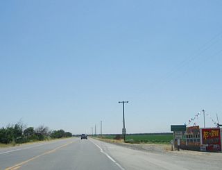 After passing the Welty Road and Greenwood Road intersections, California 132 leaves San Joaquin County and enters Stanislaus County.