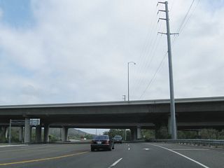 California 133 north prepares to pass under California 73.