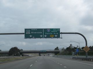 The right two lanes of California 133 (Laguna Freeway) north connect to Exit 10, Interstate 5 (Santa Ana Freeway) north to Santa Ana and Los Angeles.