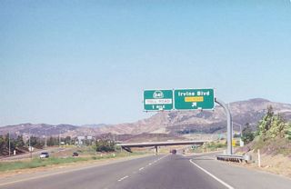 After the Interstate 5 interchanges, northbound California 133 reaches Exit 12, Irvine Boulevard. The final interchange along northbound is with California 241, the Foothill Corridor Toll Road.