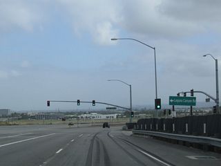 Northbound California 133 separates from Laguna Canyon Road at this traffic signal.