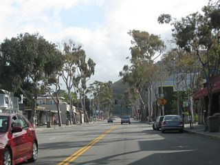 After departing California 1 (Pacific Coast Highway), California 133 (Broadway / Laguna Canyon Road) passes through Downtown Laguna Beach. The first traffic signal along California 133 north is with Beach Street.