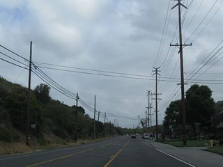California 133 (Laguna Canyon Road) briefly narrows to a three-lane configuration prior to meeting El Toro Road and California 73.