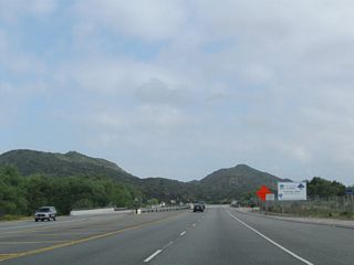 Beyond the exchange with SR 73, SR 133 proceeds north onto a newer expressway segment that extends north to Interstate 405.