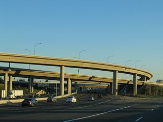 The transition between Interstate 5 south and California 133 (Laguna Freeway) south includes an off-ramp to Barranca Parkway. The sprawling interchange connects the toll road network with the Laguna Freeway.